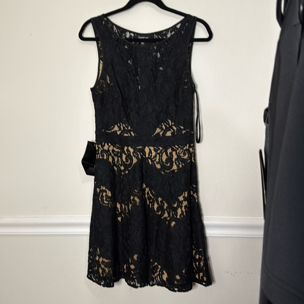 Bebe. Black lace dress over cream